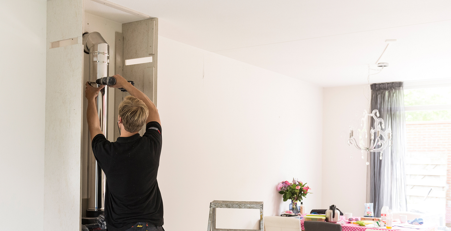 Mag de afvoer door de muur?